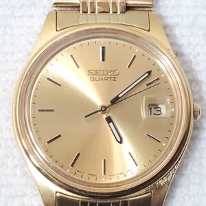 Vintage Seiko Gold Tone Men’s Date Quartz Watch Stainless Steel WR 30 Meters